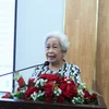 Bà Lương Thị Thuận - Chủ tịch Hội Bảo trợ trẻ em TPHCM - phát biểu khai mạc hội nghị. (Nguồn: Báo Phụ nữ)