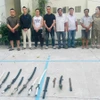 Các đối tượng trong băng nhóm giang hồ bị triệt phá. (Ảnh: TTXVN phát)
