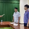 Cơ quan điều tra VKSND tối cao tống đạt quyết định tố tụng đối với bị can Lê Quốc Việt. (Ảnh: Cơ quan điều tra VKSND Tối cao)