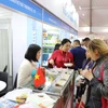 Khách tham quan Cụm gian hàng nông sản của doanh nghiệp TP. Hồ Chí Minh tại Triển lãm Food Africa 2025. (Ảnh: Nguyễn Trường/TTXVN)