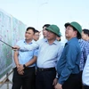 Lãnh đạo tỉnh Đắk Lắk báo cáo tiến độ Dự án cho Đoàn công tác. (Ảnh: Tuấn Anh/TTXVN)