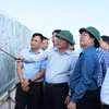 Lãnh đạo tỉnh Đắk Lắk báo cáo tiến độ Dự án cho Đoàn công tác. (Ảnh: Tuấn Anh/TTXVN)