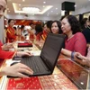 Giá vàng trong nước đã tăng lên mức 154 triệu đồng mỗi lượng. (Ảnh: Vietnam+)
