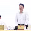 Thứ trưởng Bộ Tài chính Trần Quốc Phương trả lời tại Họp báo Chính phủ. (Ảnh: Vietnam+)