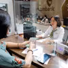 Ngân hàng tăng tốc hút dòng tiền nhàn rỗi. (Ảnh: Trần Việt/TTXVN)