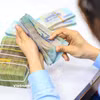 Theo số liệu tổng hợp từ các Bộ, ngành và địa phương, tổng kinh phí tiết kiệm được từ quá trình tinh gọn bộ máy đạt khoảng 11.000 tỷ đồng. (Ảnh: Vietnam+)