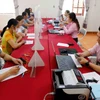 Ngay sau ngày 1/7 mô hình chính quyền địa phương 2 cấp chính thức đi vào hoạt động, Ngân hàng Chính sách xã hội chỉ đạo chi nhánh Ngân hàng Chính sách xã hội các tỉnh, thành phố duy trì thực hiện ngay việc giao dịch giải ngân thuận lợi cho người dân. (Ảnh: Vietnam+)
