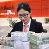 Ngân hàng Nhà nước nâng lên 50% tỷ lệ tính tiền gửi Kho bạc Nhà nước. (Ảnh: Vietnam+)
