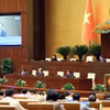 Quốc hội thảo luận về dự án Luật Thủ đô (sửa đổi) và Luật Tiếp cận thông tin (sửa đổi). (Ảnh: An Đăng/TTXVN)