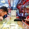 Giá vàng trong nước đi ngang, giao dịch quanh mức 156,4 triệu đồng. (Ảnh: Vietnam+)
