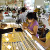 Giá vàng giảm phiên thứ 4 liên tiếp, giao dịch quanh mức 156,5 triệu đồng. (Ảnh: TTXVN)