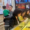 Giá vàng SJC tiếp tục giảm nhẹ, giao dịch quanh mức 154,4 triệu đồng. (Ảnh: Vietnam+)