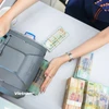 Ngân hàng Nhà nước yêu cầu miễn, giảm lãi vay cho người dân sau bão số 3. (Ảnh: Vietnam+)