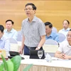 Ông Nguyễn Duy Hoàng - Cục trưởng Cục Kiểm soát thủ tục hành chính Văn phòng Chính phủ trả lời họp báo Chính phủ chiều ngày 4/6. (Ảnh: Vietnam+)