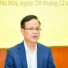 Ông Phạm Chí Quang, Vụ trưởng Vụ Chính sách tiền tệ Ngân hàng Nhà nước chia sẻ tại họp báo. (Ảnh: Vietnam+)