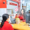 Agribank tiên phong giảm đồng thời cả lãi suất cho vay và tiền gửi. (Ảnh: Vietnam+)