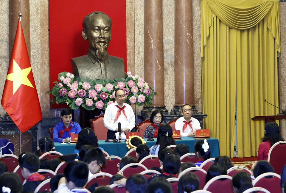 Chủ tịch nước Nguyễn Xuân Phúc phát biểu tại buổi gặp mặt. (Ảnh: Thống Nhất/TTXVN)