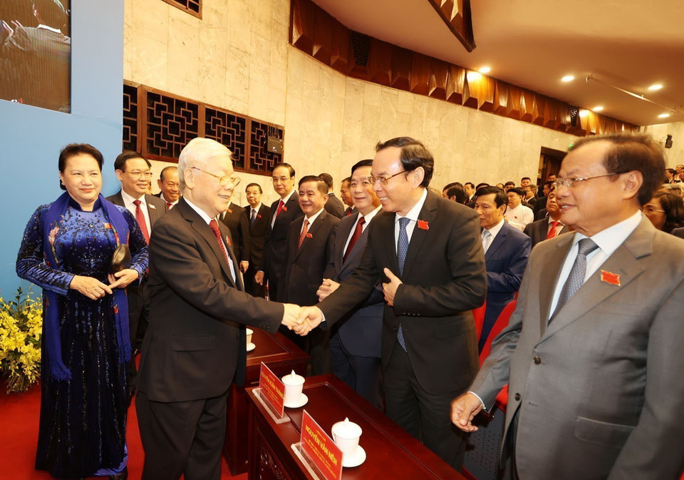 Tổng Bí thư, Chủ tịch nước Nguyễn Phú Trọng và Chủ tịch Quốc hội Nguyễn Thị Kim Ngân với các đại biểu dự Đại hội. (Ảnh: Trí Dũng/TTXVN)