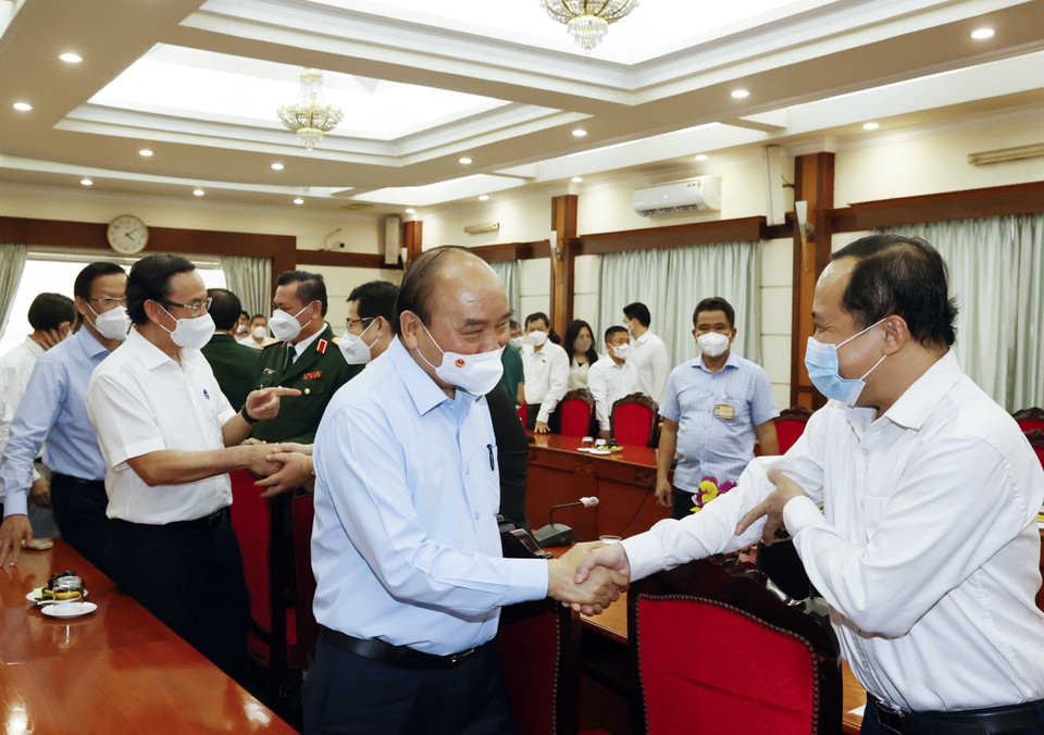 Chủ tịch nước và Đoàn Đại biểu Quốc hội Thành phố Hồ Chí Minh. (Ảnh: Thống Nhất/TTXVN)