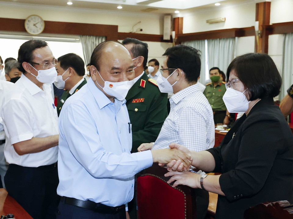 Chủ tịch nước Nguyễn Xuân Phúc tới thăm, làm việc với Đoàn Đại biểu Quốc hội Thành phố Hồ Chí Minh. (Ảnh: Thống Nhất/TTXVN)