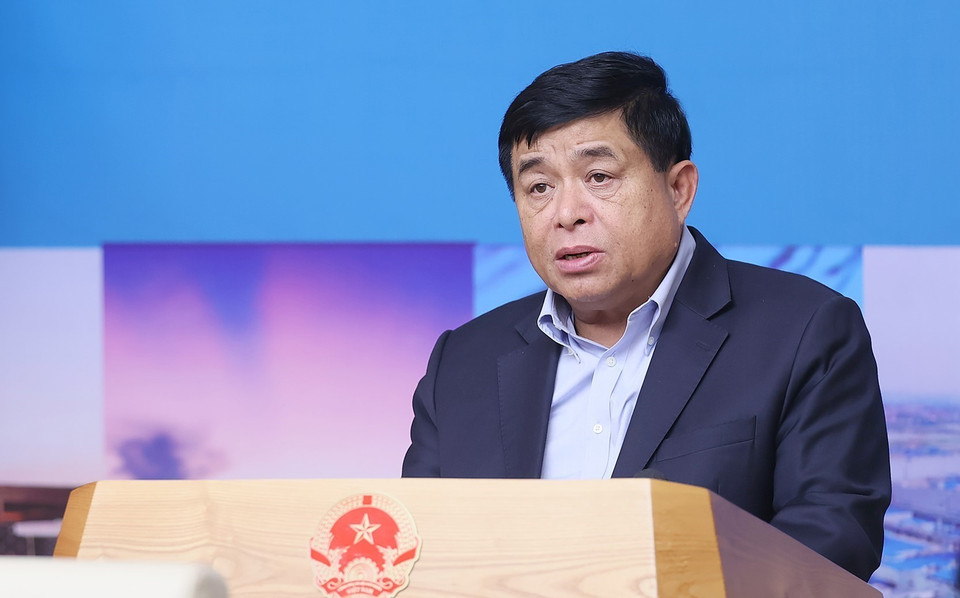 Bộ trưởng Bộ Kế hoạch và Đầu tư Nguyễn Chí Dũng báo cáo Quy hoạch vùng Đồng bằng Sông Hồng thời kỳ 2021-2030, tầm nhìn đến 2050. (Ảnh: Dương Giang/TTXVN)