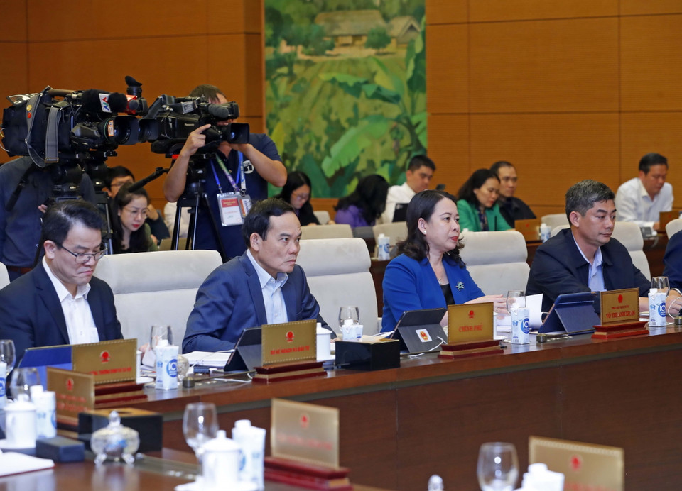 Phó Chủ tịch nước Võ Thị Ánh Xuân; Phó Thủ tướng Trần Lưu Quang và các đại biểu dự phiên khai mạc. (Ảnh: Nhan Sáng/TTXVN)