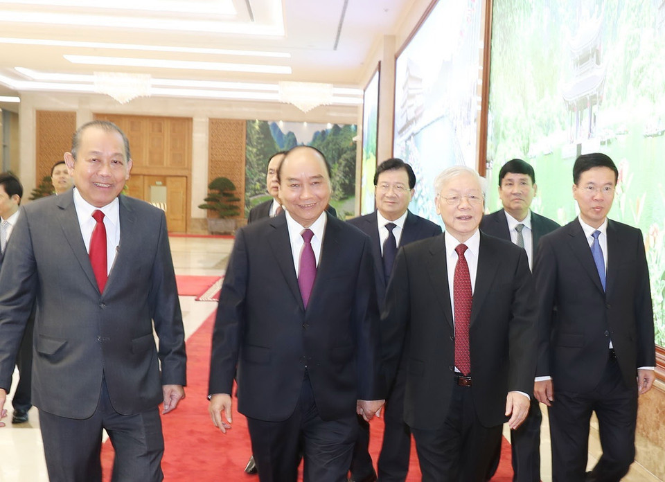 Tổng Bí thư, Chủ tịch nước Nguyễn Phú Trọng, Thủ tướng Chính phủ Nguyễn Xuân Phúc và các đại biểu đến dự Hội nghị. (Ảnh: Trí Dũng/TTXVN)