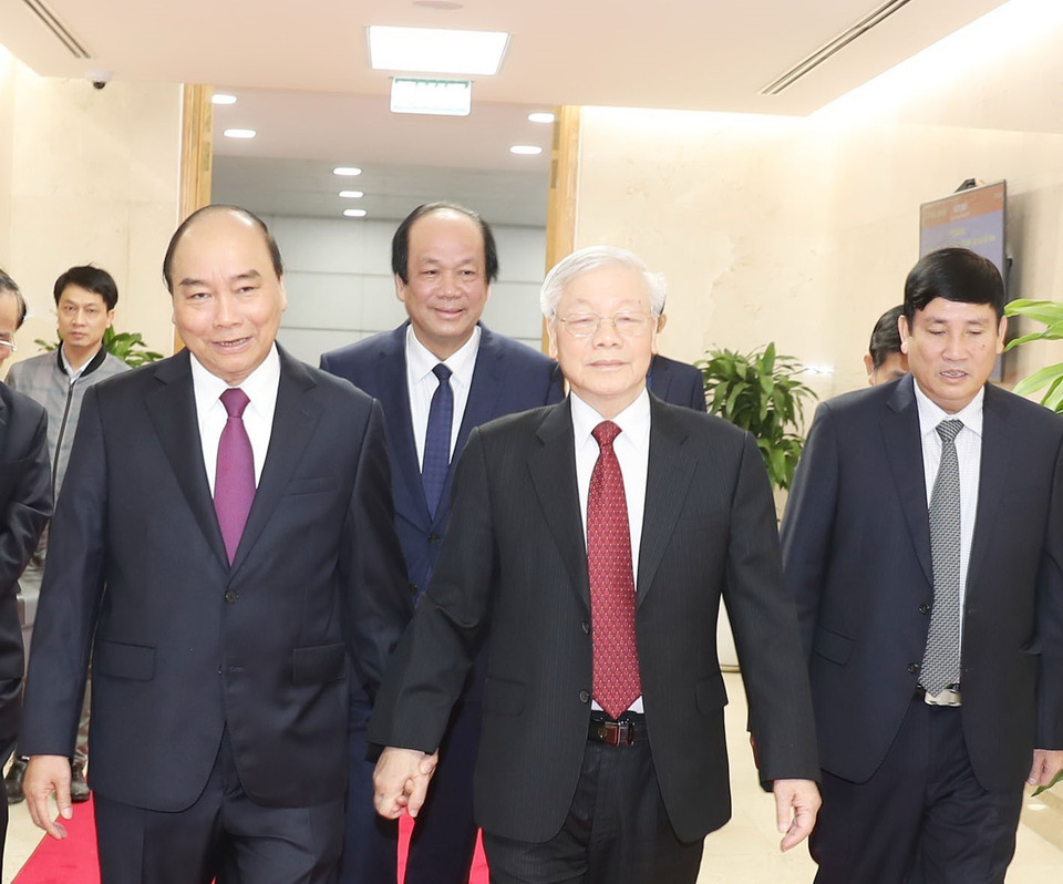 Thủ tướng Chính phủ Nguyễn Xuân Phúc đón Tổng Bí thư, Chủ tịch nước Nguyễn Phú Trọng đến dự Hội nghị. (Ảnh: Trí Dũng/TTXVN)