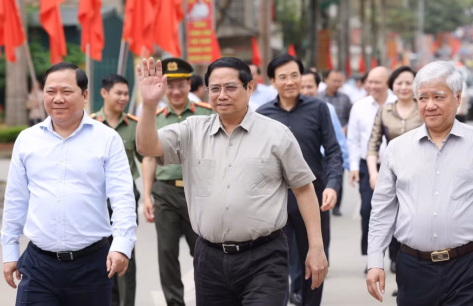 Thủ tướng Phạm Minh Chính, Chủ tịch Hội đồng Thi đua-Khen thưởng Trung ương, đến dự Lễ phát động Phong trào thi đua “Xóa nhà tạm, nhà dột nát” trong cả nước. (Ảnh: Dương Giang/TTXVN)