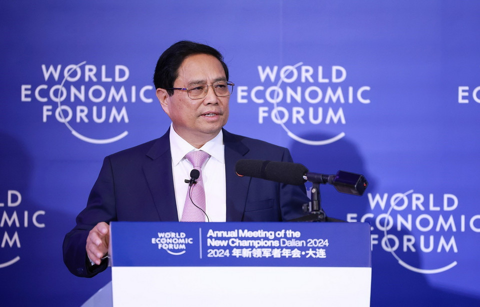 Thủ tướng Phạm Minh Chính đối thoại với lãnh đạo các tập đoàn lớn của WEF. (Ảnh: Dương Giang/TTXVN)