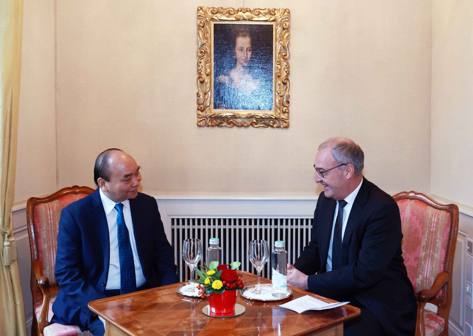 Chủ tịch nước Nguyễn Xuân Phúc và Tổng thống Liên bang Thụy Sĩ Guy Parmelin. (Ảnh: Thống Nhất/TTXVN)