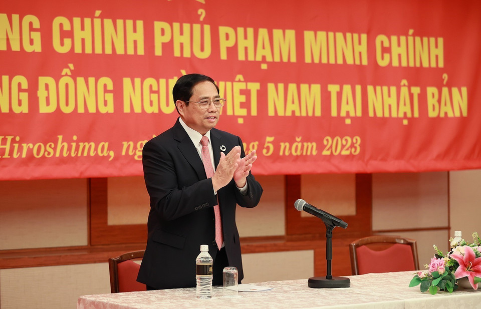 Thủ tướng Phạm Minh Chính gặp cộng đồng người Việt Nam tại Nhật Bản. (Ảnh: Dương Giang/TTXVN)
