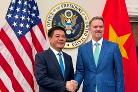 Bộ trưởng Bộ Công thương Nguyễn Hồng Diên và Đại sứ, Trưởng Đại diện Thương mại Hoa Kỳ Jamieson Greer tại phiên đàm phán. (Ảnh: TTXVN phát)