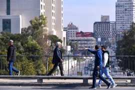 Người dân tại Thủ đô Damascus (Syria) ngày 10/12/2024. (Ảnh: THX/TTXVN)