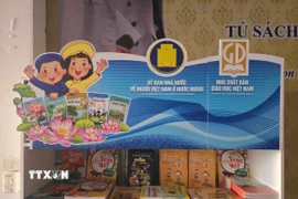 Một góc tủ sách tại Trường tiếng Việt tiểu học Khánh An, Thái Lan. (Ảnh: Huy Tiến/TTXVN)