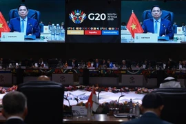 Thủ tướng Phạm Minh Chính phát biểu tại Phiên thảo luận thứ ba Hội nghị Thượng đỉnh G20. (Ảnh: Dương Giang/TTXVN)