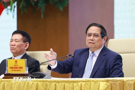 Thủ tướng Phạm Minh Chính chủ trì buổi làm việc. (Ảnh: Dương Giang/TTXVN)