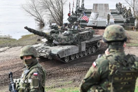 Xe quân sự Mỹ tham gia một cuộc tập trận của NATO. (Nguồn: PAP/TTXVN)