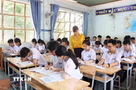 Một buổi học tại Trường Trung học Cơ sở Tân Phú, thành phố Đồng Xoài (Bình Phước). (Ảnh: Đậu Tất Thành/TTXVN)