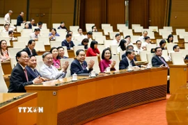 Tổng Bí thư Tô Lâm, Chủ tịch Quốc hội Trần Thanh Mẫn và đại biểu Quốc hội dự lễ công bố. (Ảnh: Doãn Tấn/TTXVN)