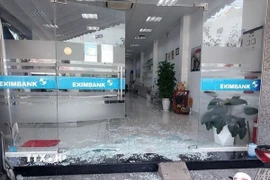 Hiện trường ngân hàng bị cướp. (Ảnh: TTXVN phát)