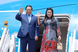 Thủ tướng Phạm Minh Chính và Phu nhân. (Ảnh: Dương Giang/TTXVN)