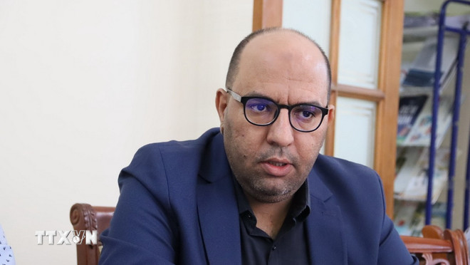 Ông Mohammed Allout, Giám đốc Công ty Wonpact của Algeria, phát biểu tại hội thảo.( Ảnh: Mạnh Hùng/TTXVN) ttxvn-vn-angie-3.jpg