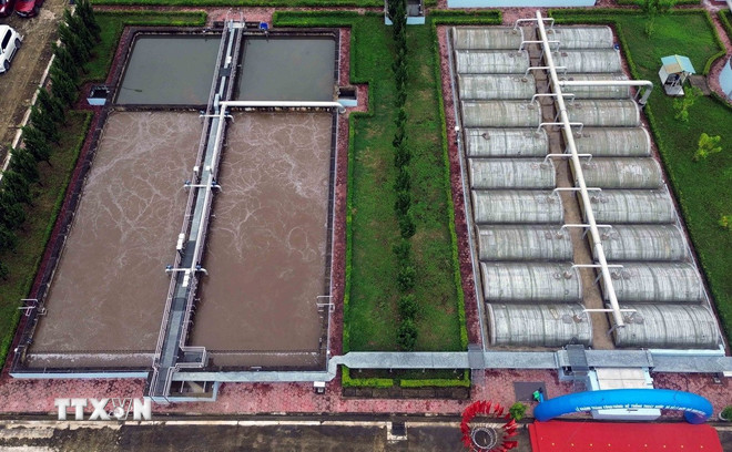 Hệ thống xử lý nước thải thành phố Sơn La nhìn từ trên cao. (Ảnh: Quang Quyết/TTXVN) ttxvn-xu-ly-chat-thai.jpg