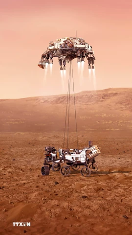 Tàu thám hiểm Perseverance của NASA hạ cánh xuống sao Hỏa. (Ảnh: THX/TTXVN)