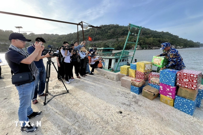 Phóng viên tác nghiệp. (Ảnh minh họa: TTXVN phát)