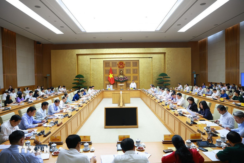 Cuộc họp giữa Đảng ủy Chính phủ và Đảng ủy Quốc hội nhằm chuẩn bị cho Kỳ họp thứ 10, Quốc hội khóa XV. (Ảnh: Dương Giang/TTXVN)