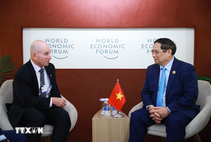 Thủ tướng Phạm Minh Chính tiếp ông Dave West, Chủ tịch Tập đoàn Cisco. (Ảnh: Dương Giang/TTXVN)