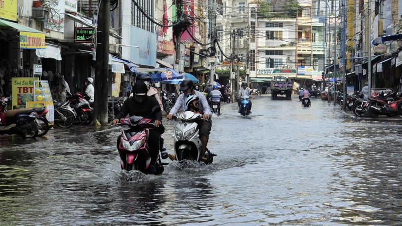 Đợt triều cường dâng cao ở Cà Mau hồi giữa tháng 12. (Ảnh: Kim Há/TTXVN)