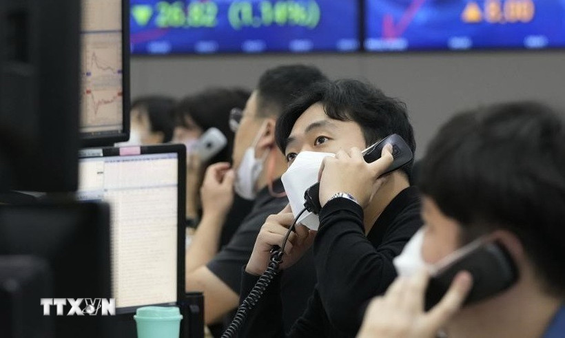 Thị trường chứng khoán châu Á đã tăng lên mức cao nhất trong sáu tuần vào phiên ngày 26/12. (Ảnh: AFP/TTXVN)